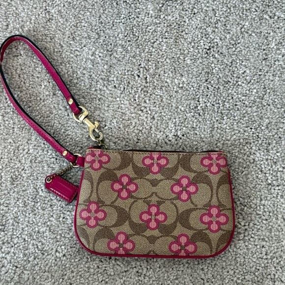 Coach Handbags - Coach Peyton Floral Brown Canvas Wristlet with Pink Floral Accents Hangtag